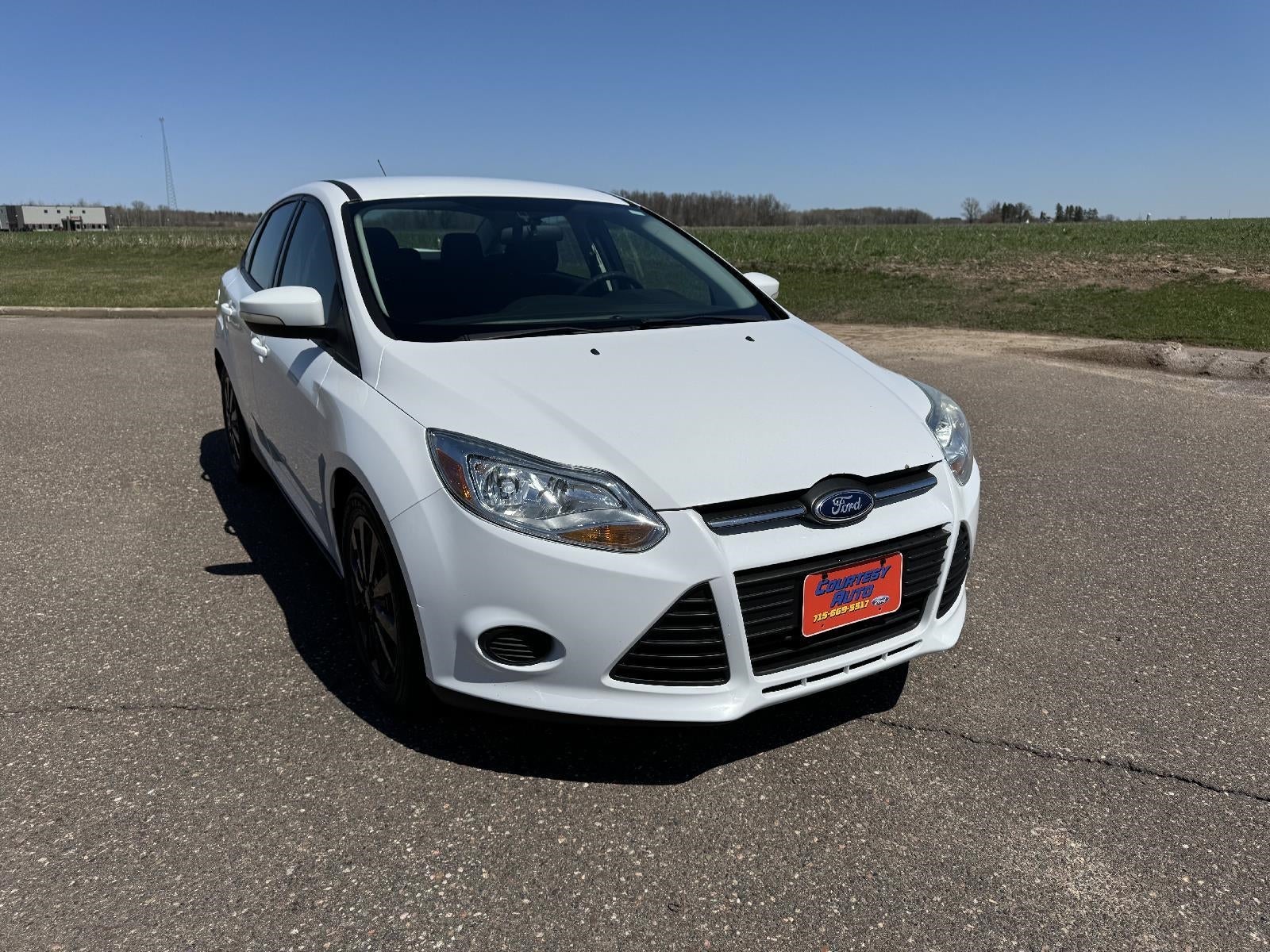 Used 2014 Ford Focus SE with VIN 1FADP3F22EL453040 for sale in Stanley, WI