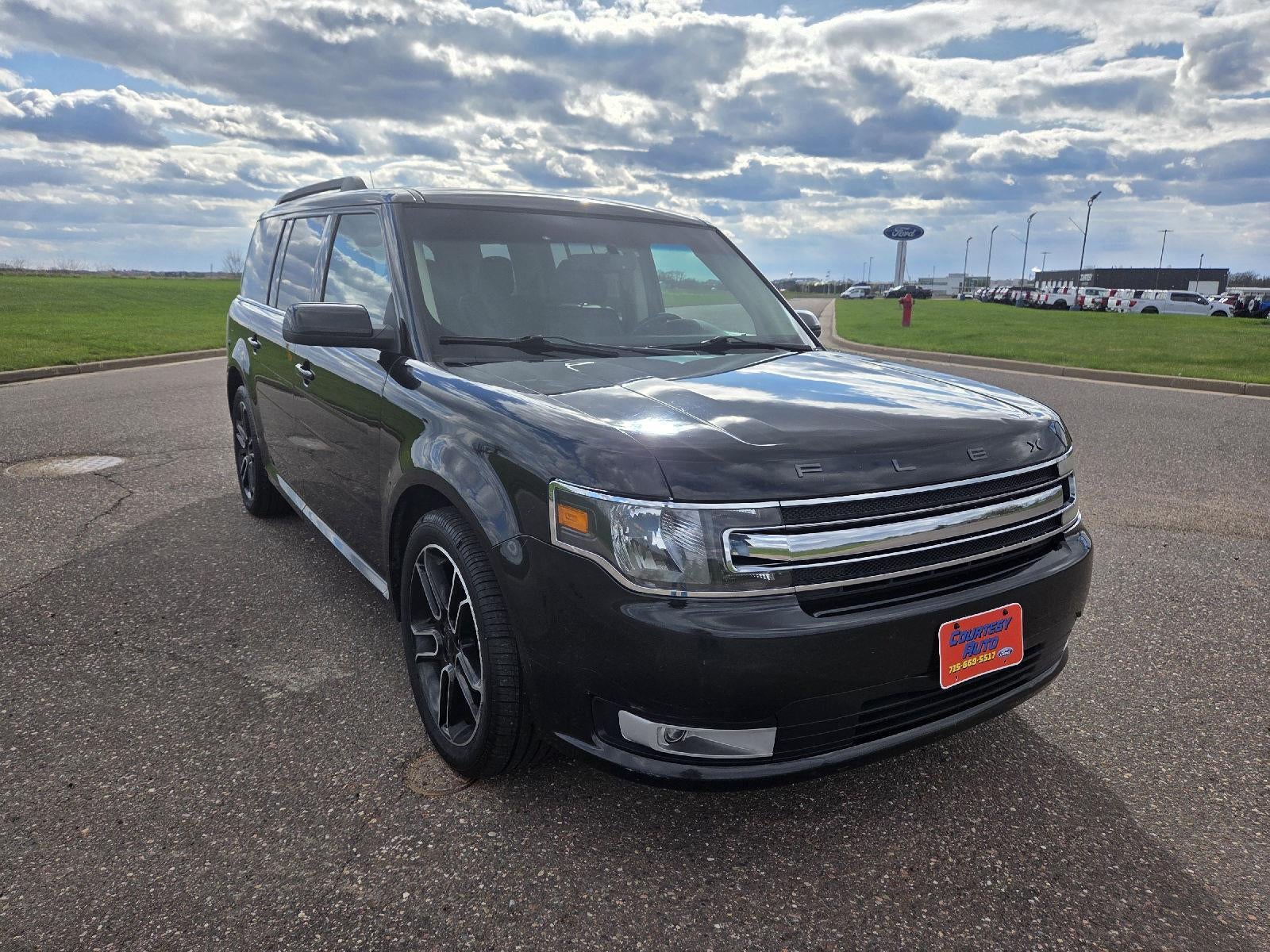 Used 2014 Ford Flex SEL with VIN 2FMHK6C89EBD38886 for sale in Stanley, WI